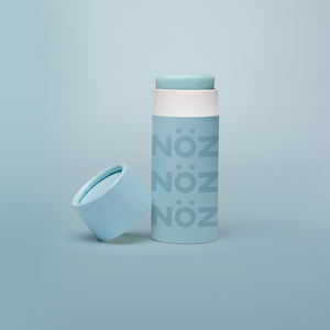 Nöz sunscreen tube with the lid off in shade blue.