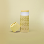 Load image into Gallery viewer, Nöz sunscreen tube with the lid off in shade yellow.
